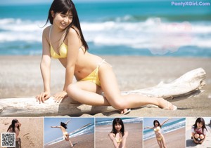 A woman in a yellow bikini sitting on a rock by the ocean.