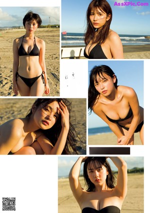 A group of women in bikinis standing next to each other.