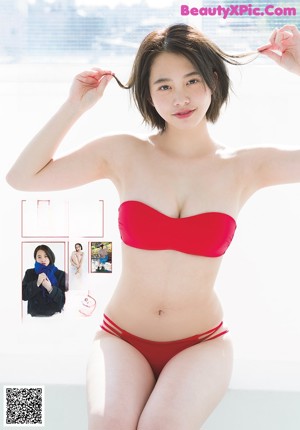 A magazine with a picture of a woman on the cover.